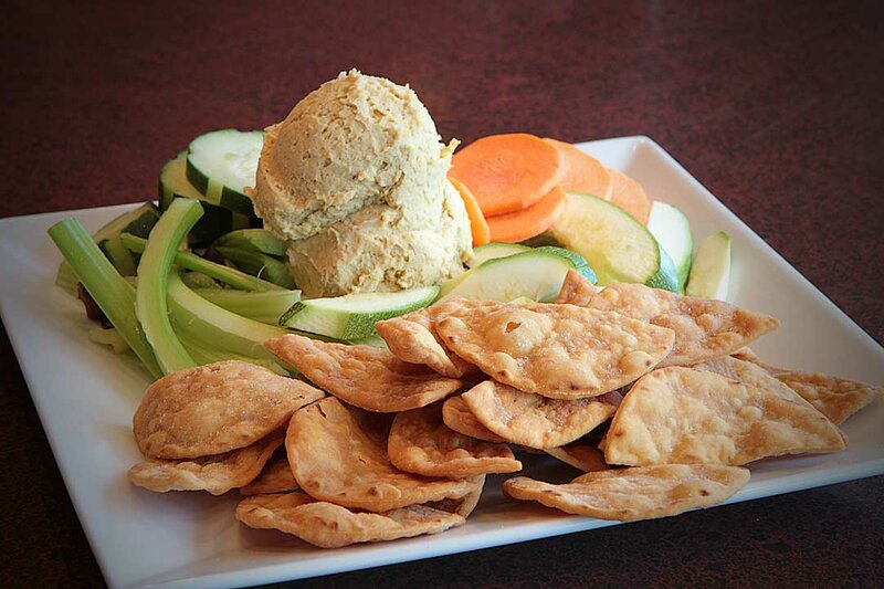 Pita chips and hummus appetizer