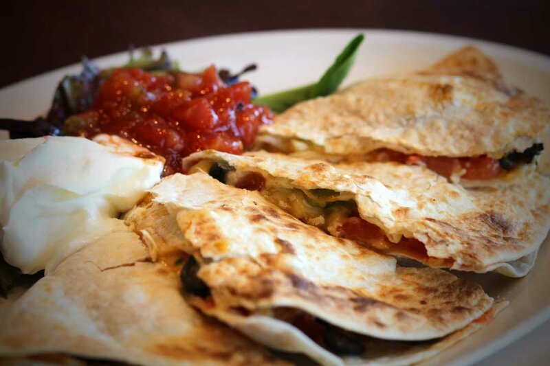 Quesadilla with sour cream and salsa